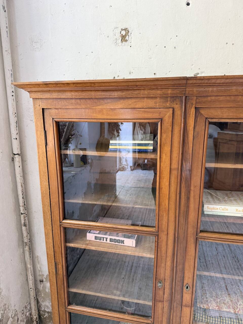 Glass-fronted walnut library 1900