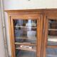 Glass-fronted walnut library 1900