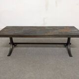 Brutalist coffee table in natural stone and wrought iron circa 1960