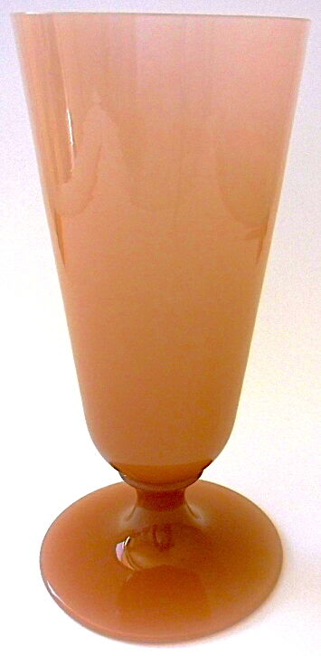 Ancient conical vase on pink soapy opaline feet