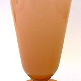 Ancient conical vase on pink soapy opaline feet