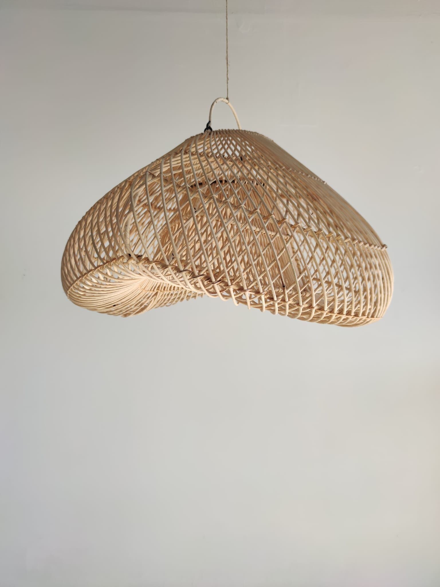 Small rattan lampshade in the shape of a braided hat