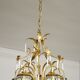 Golden metal chandelier in crystal pendants