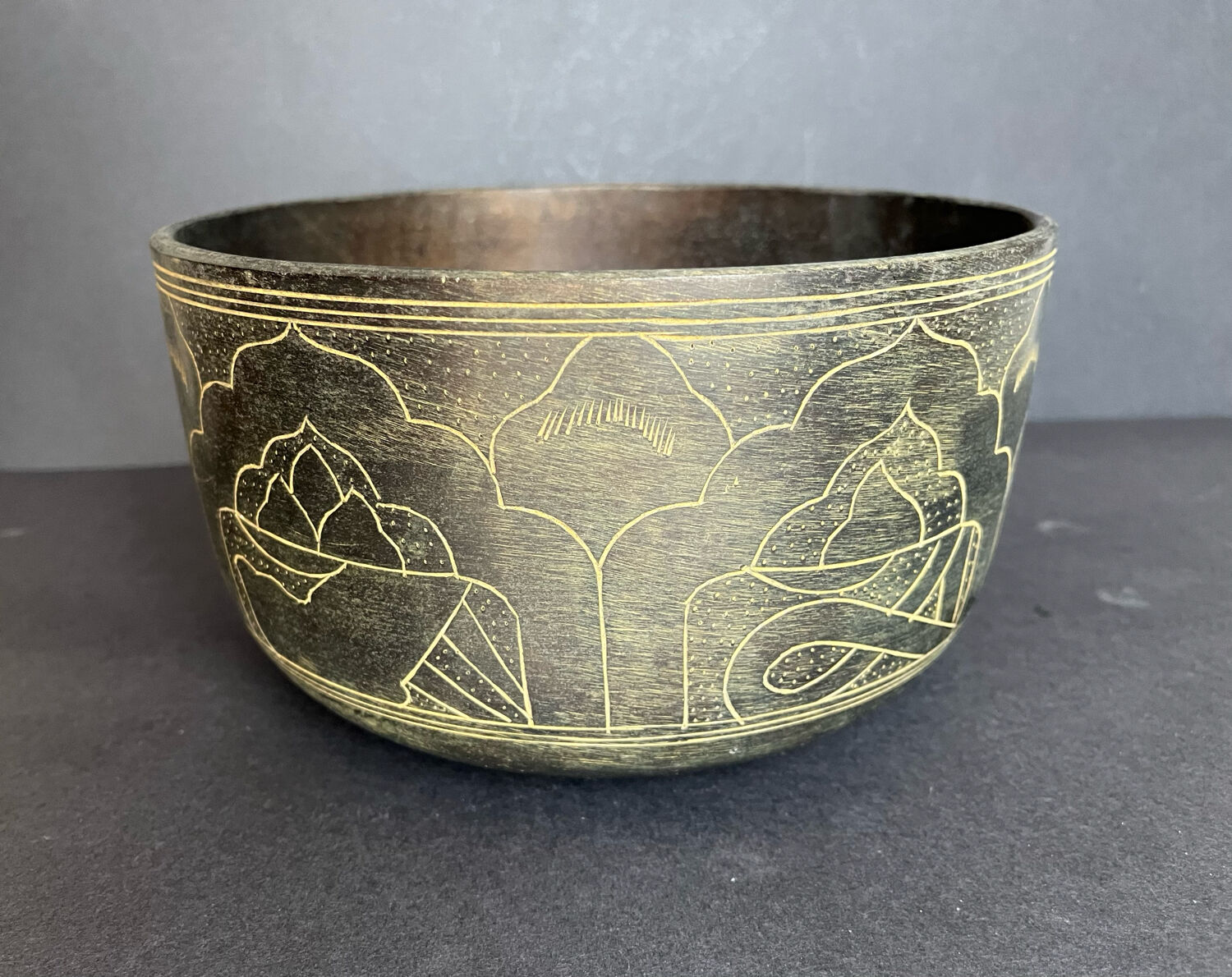 Carved bronze cup