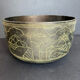 Carved bronze cup