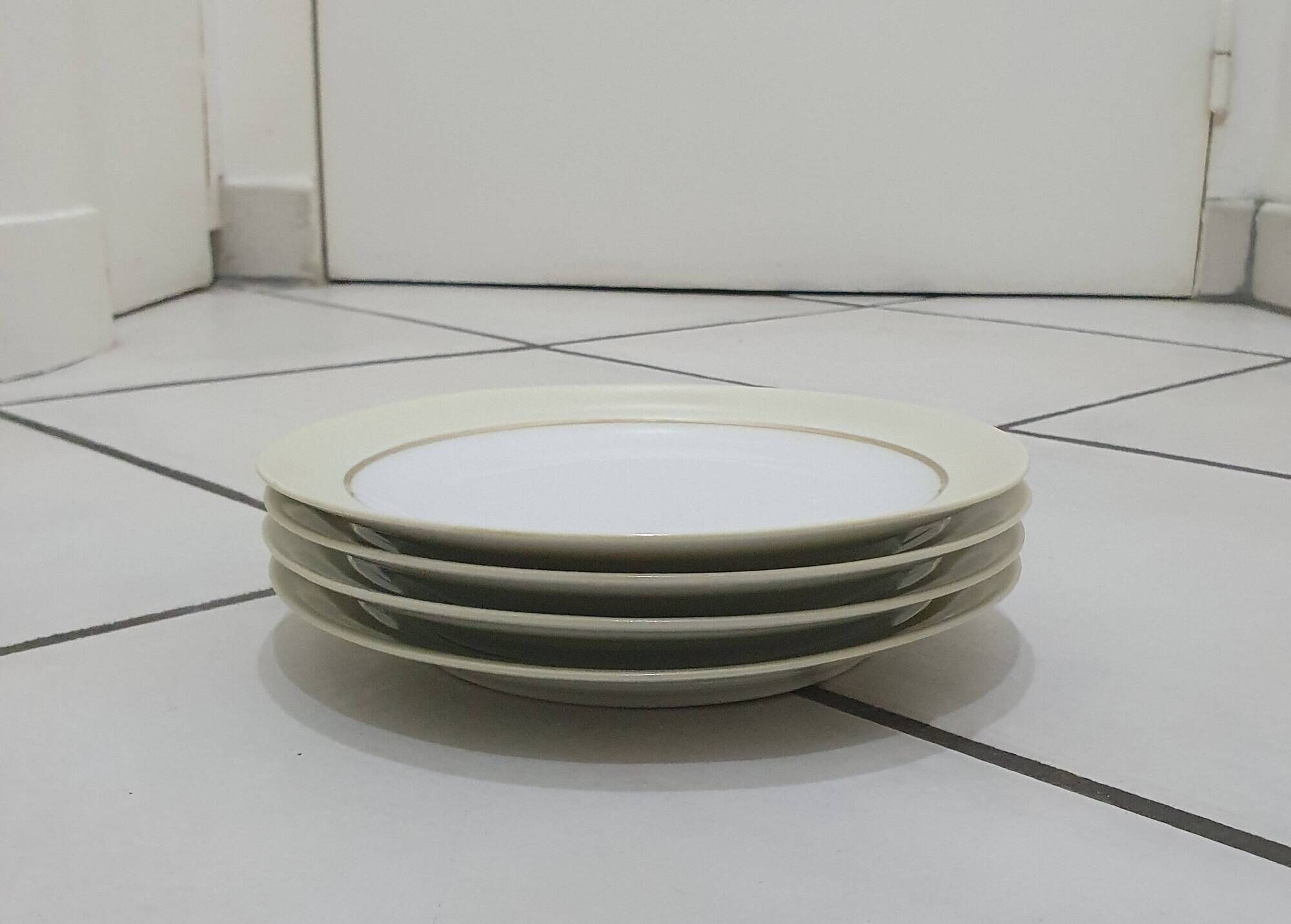 White and yellow porcelain dinner service with gold edging, Poral Limoges France