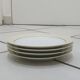 White and yellow porcelain dinner service with gold edging, Poral Limoges France