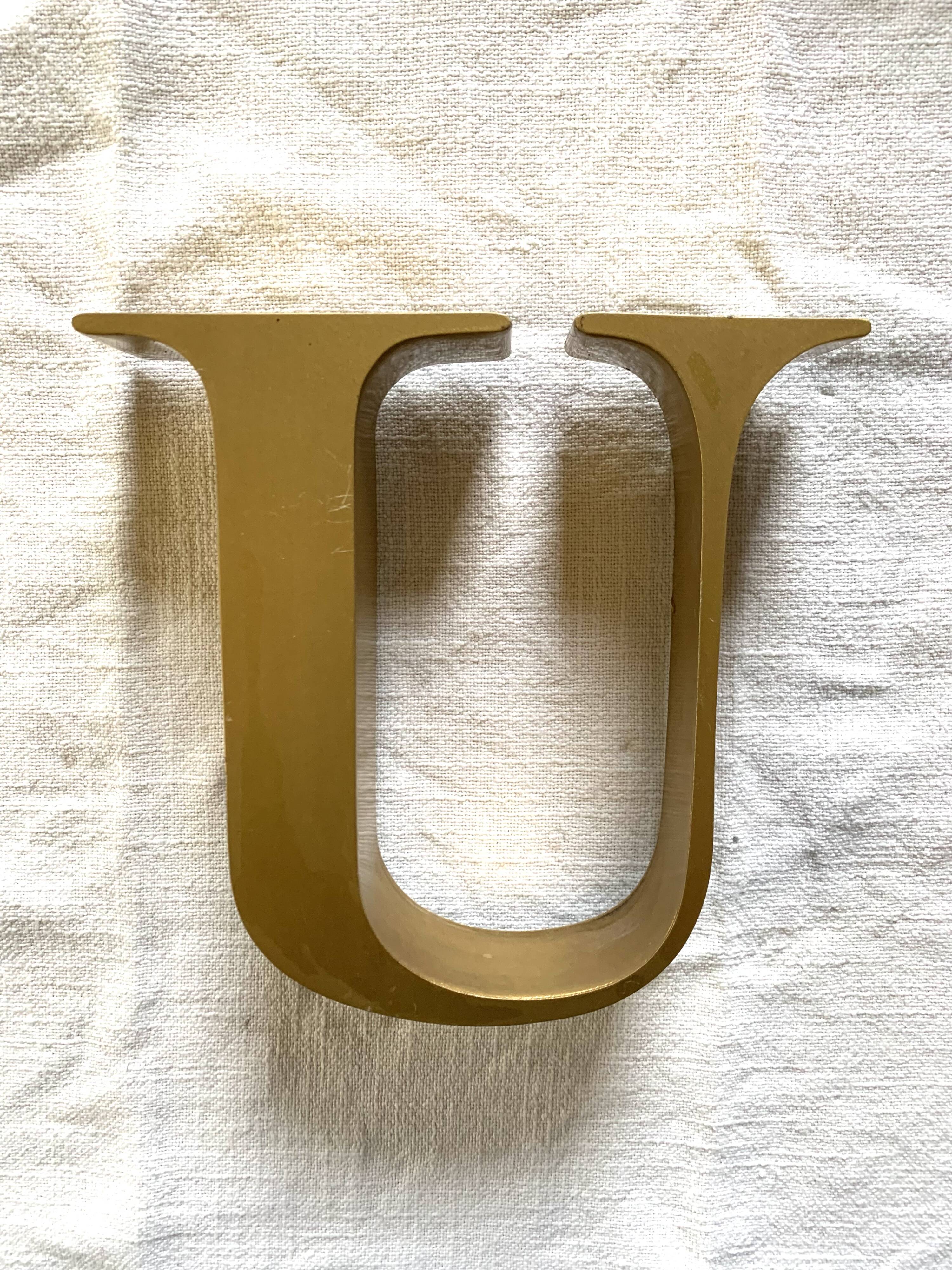 Vintage metal letter