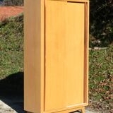 Small Scandinavian wardrobe with sliding doors - 1 side for hanging clothes.