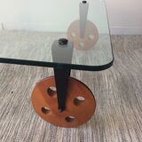 Glass coffee table on teak wheels