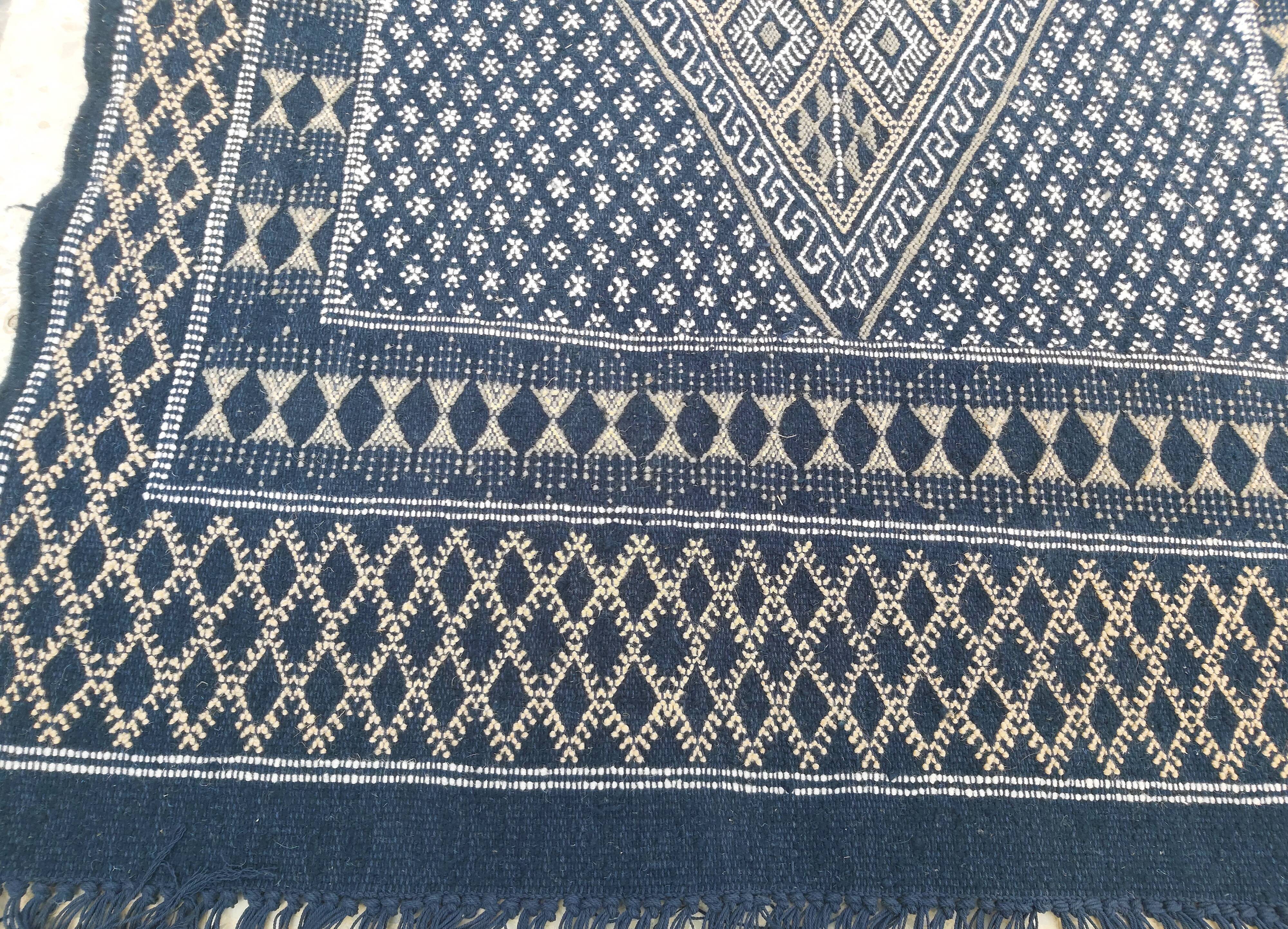 Hand-woven blue carpet in pure wool