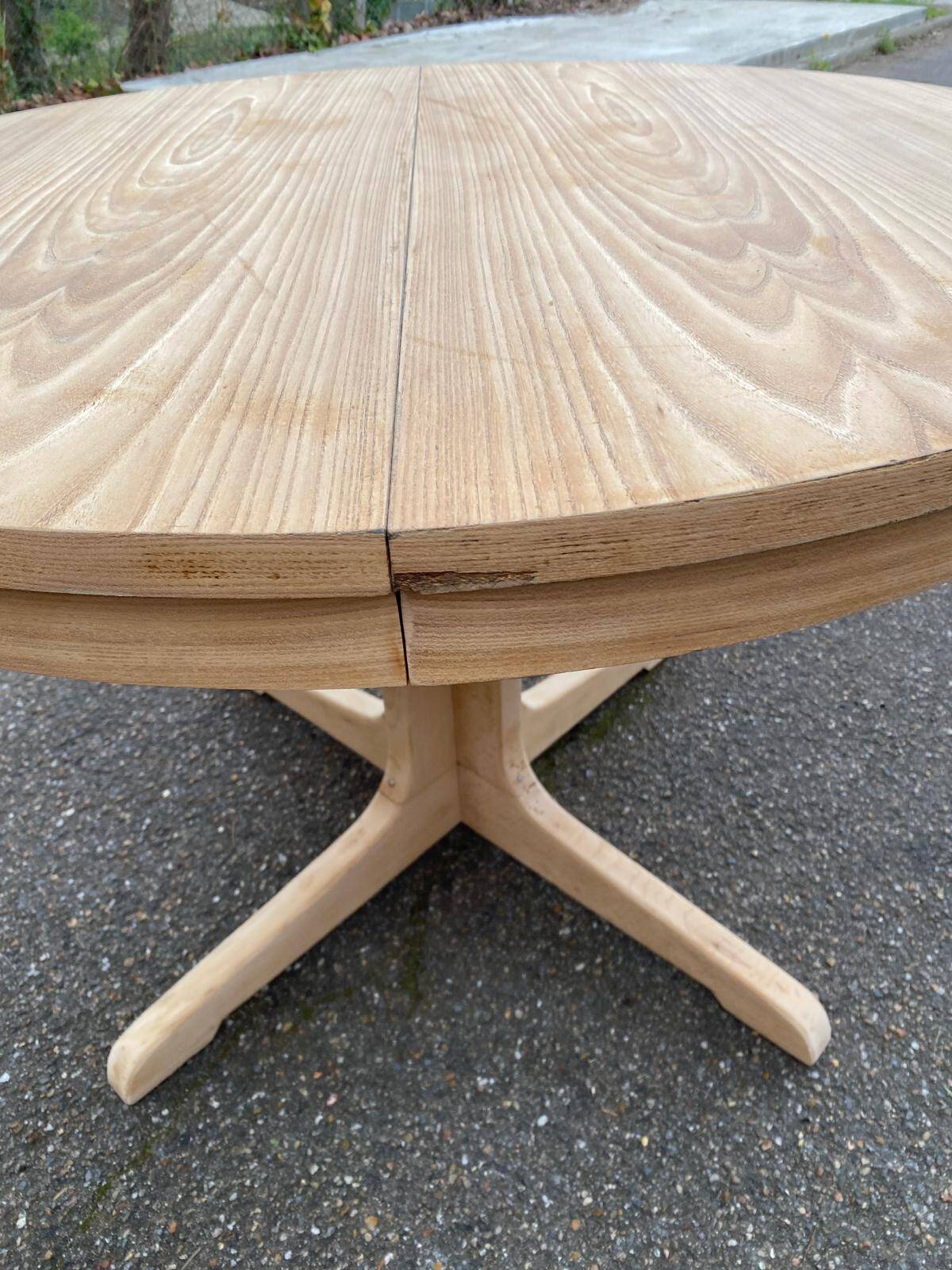 Scandinavian Baumann round extendable dining table with central leg, 115cm.