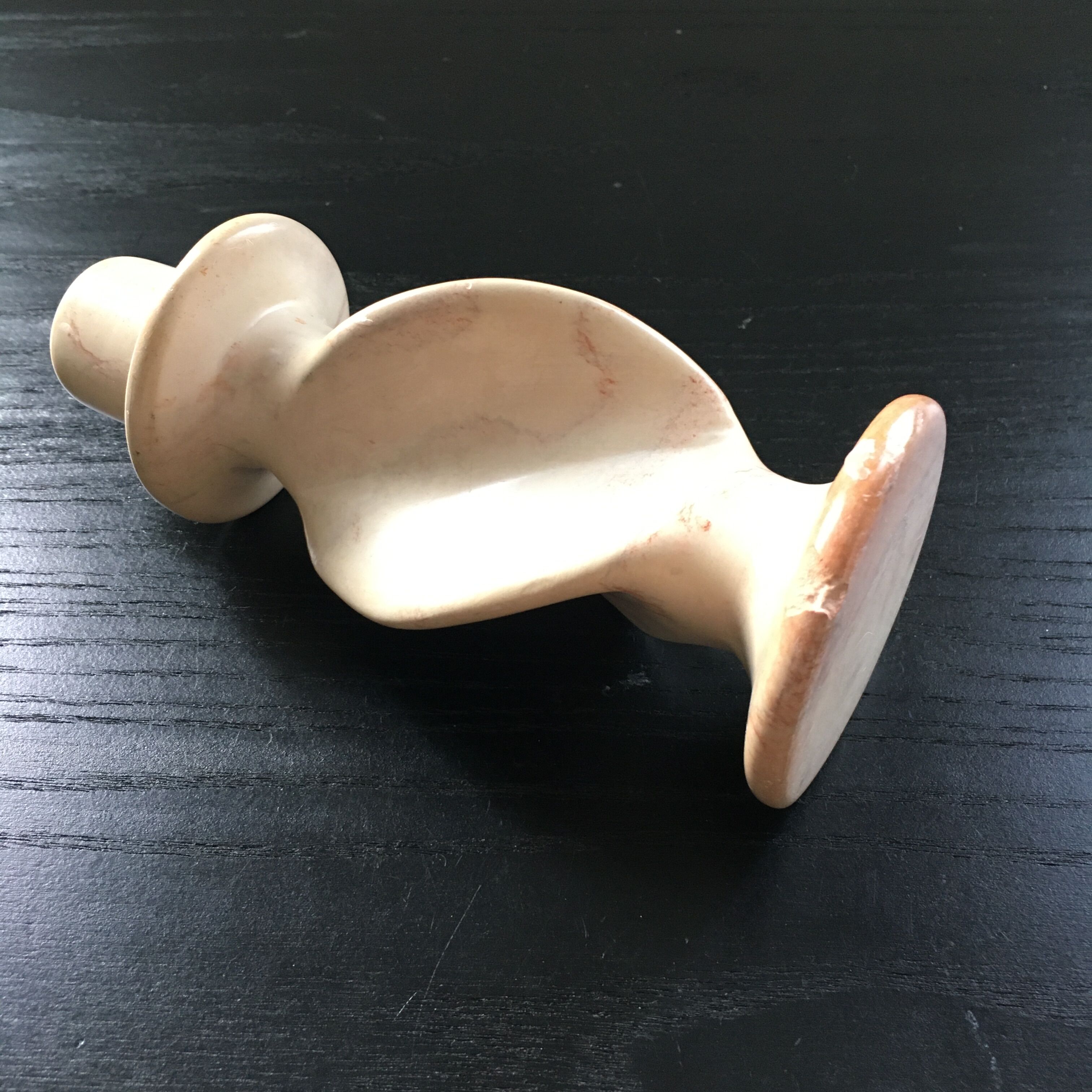 Twisted stone candle holder