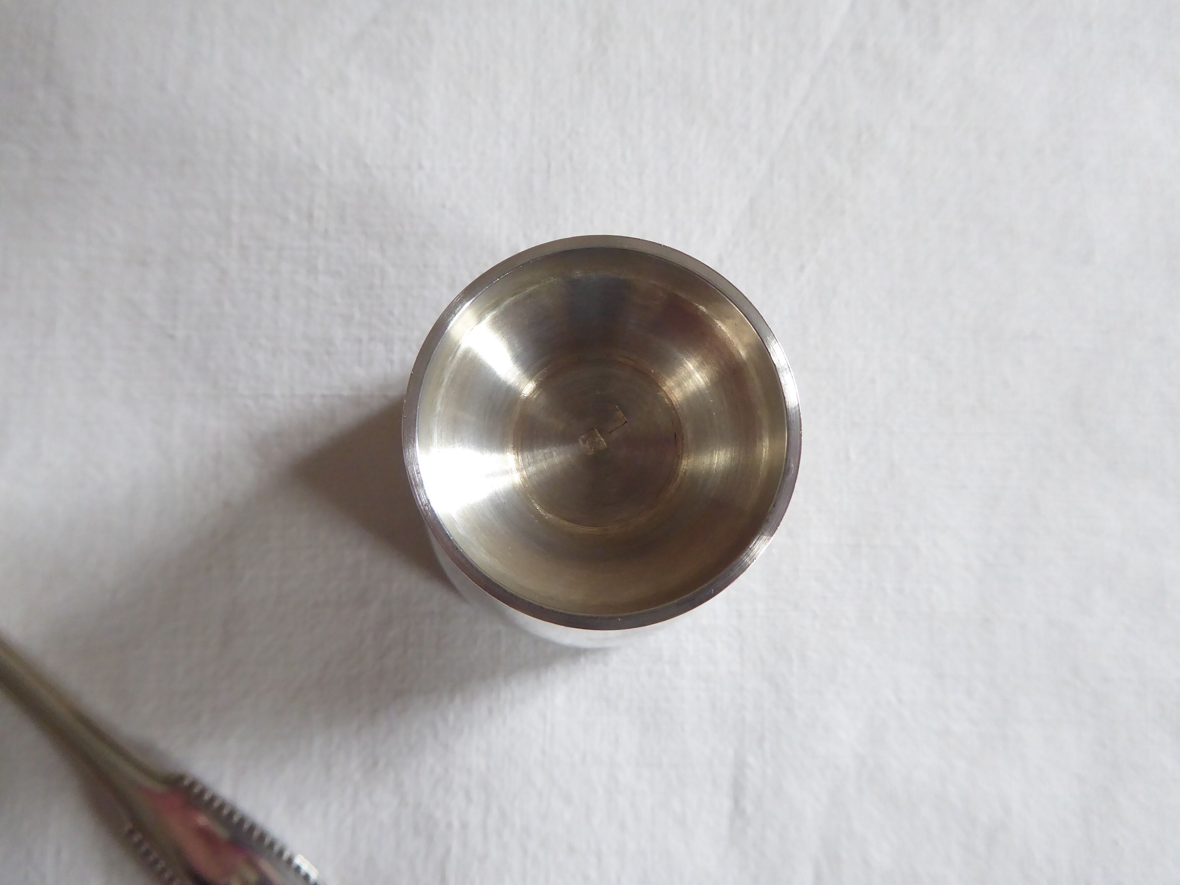 Cockerel + silver metal spoon