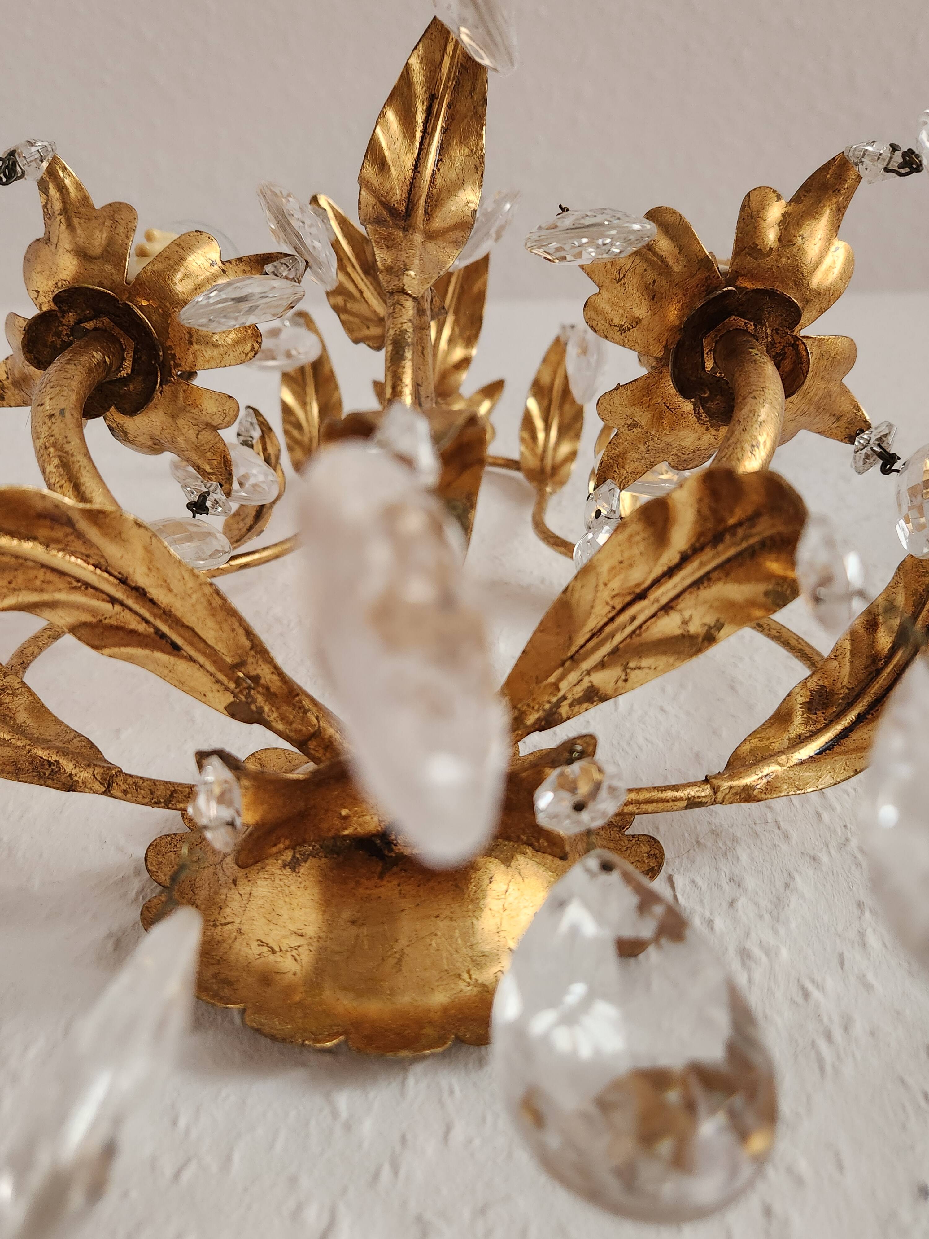 Hand-forged wall lamp gilded with gold leaf and crystals, Italy