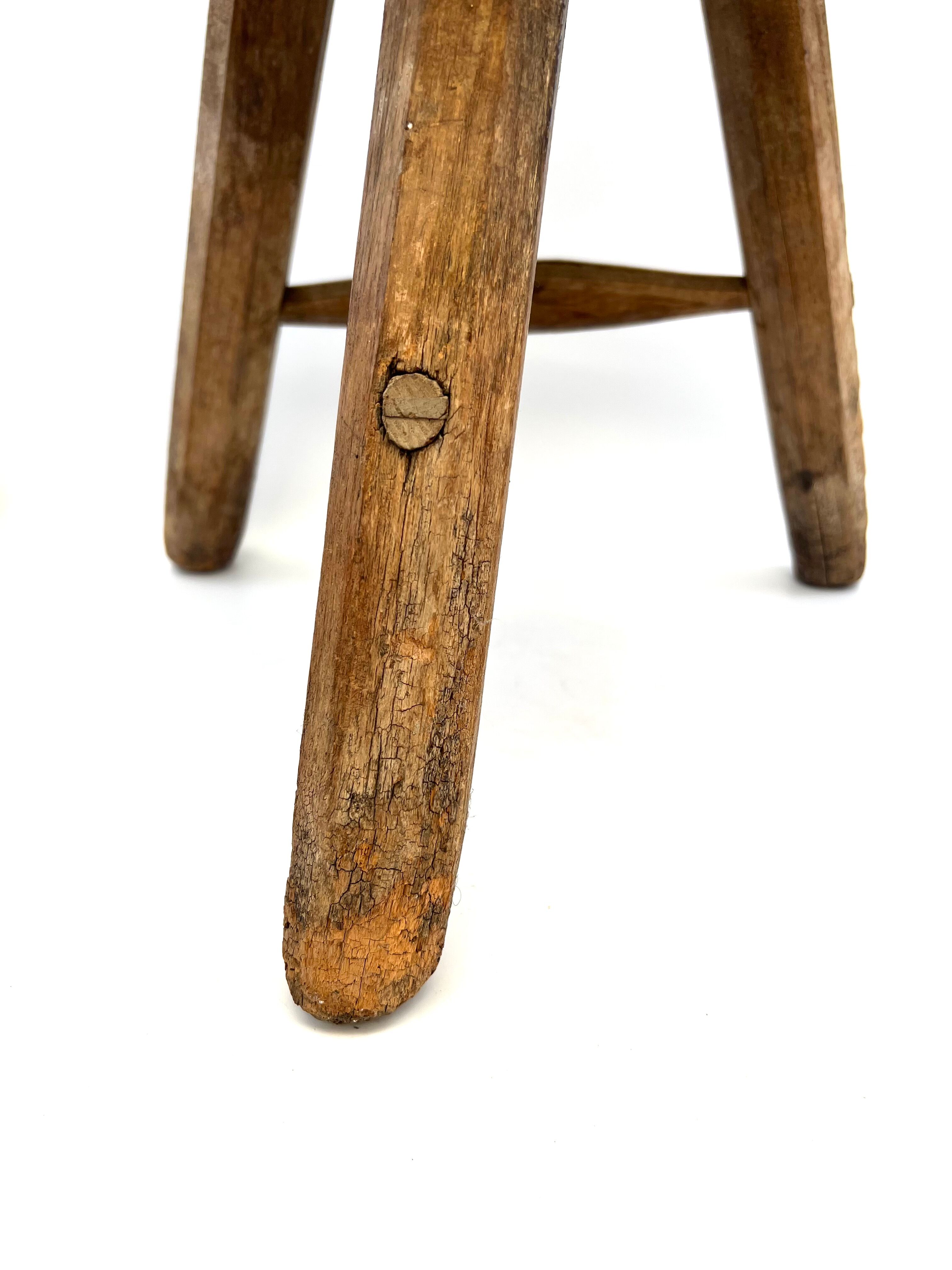 Rustic tripod wood stool