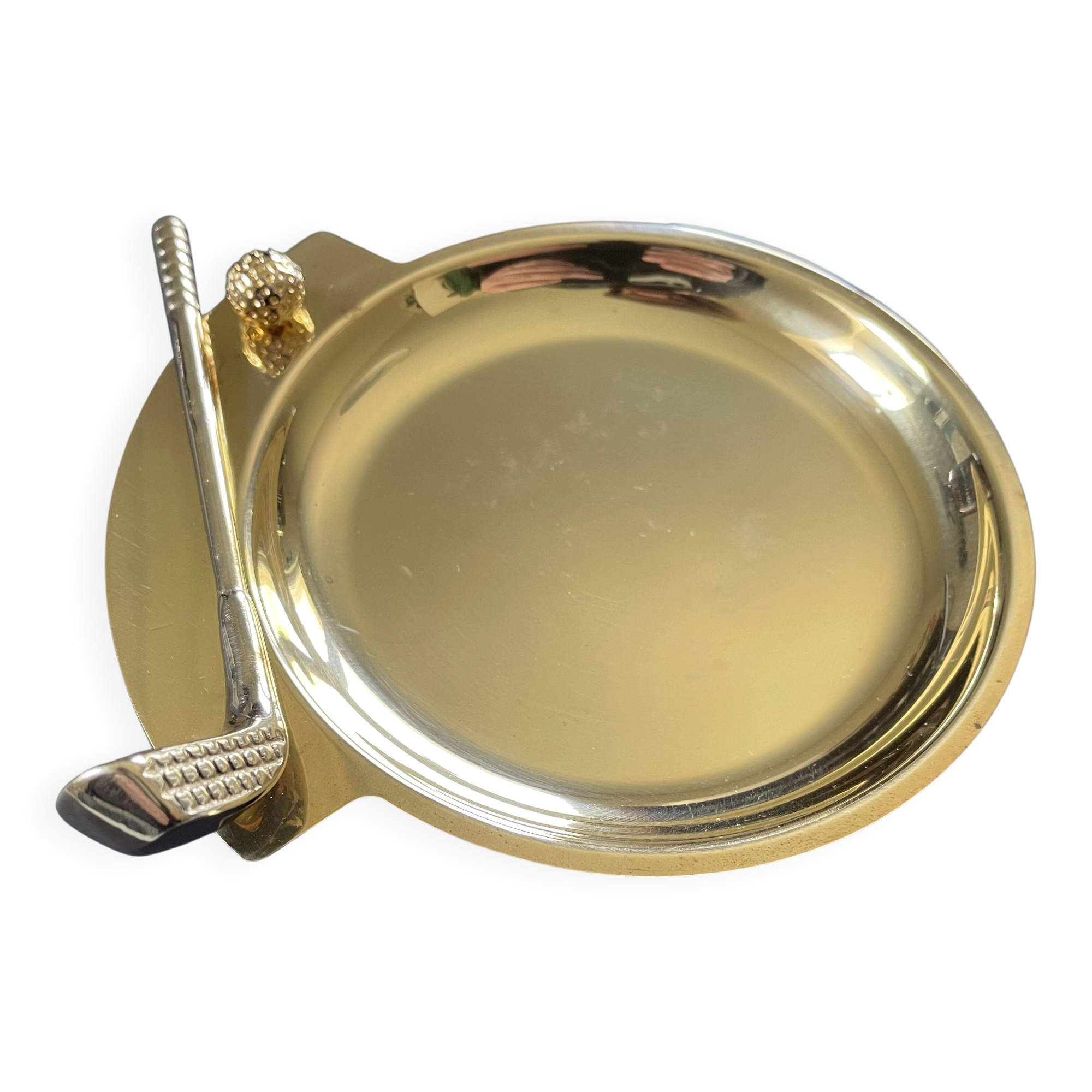 Round brass pocket tray with club and golf ball decoration.