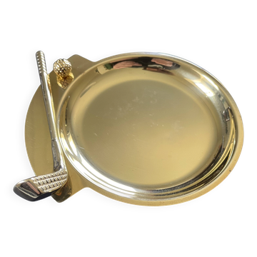 Round brass pocket tray with club and golf ball decoration.