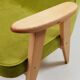 Fauteuil vintage en velours vert poire, bois naturel huilé.