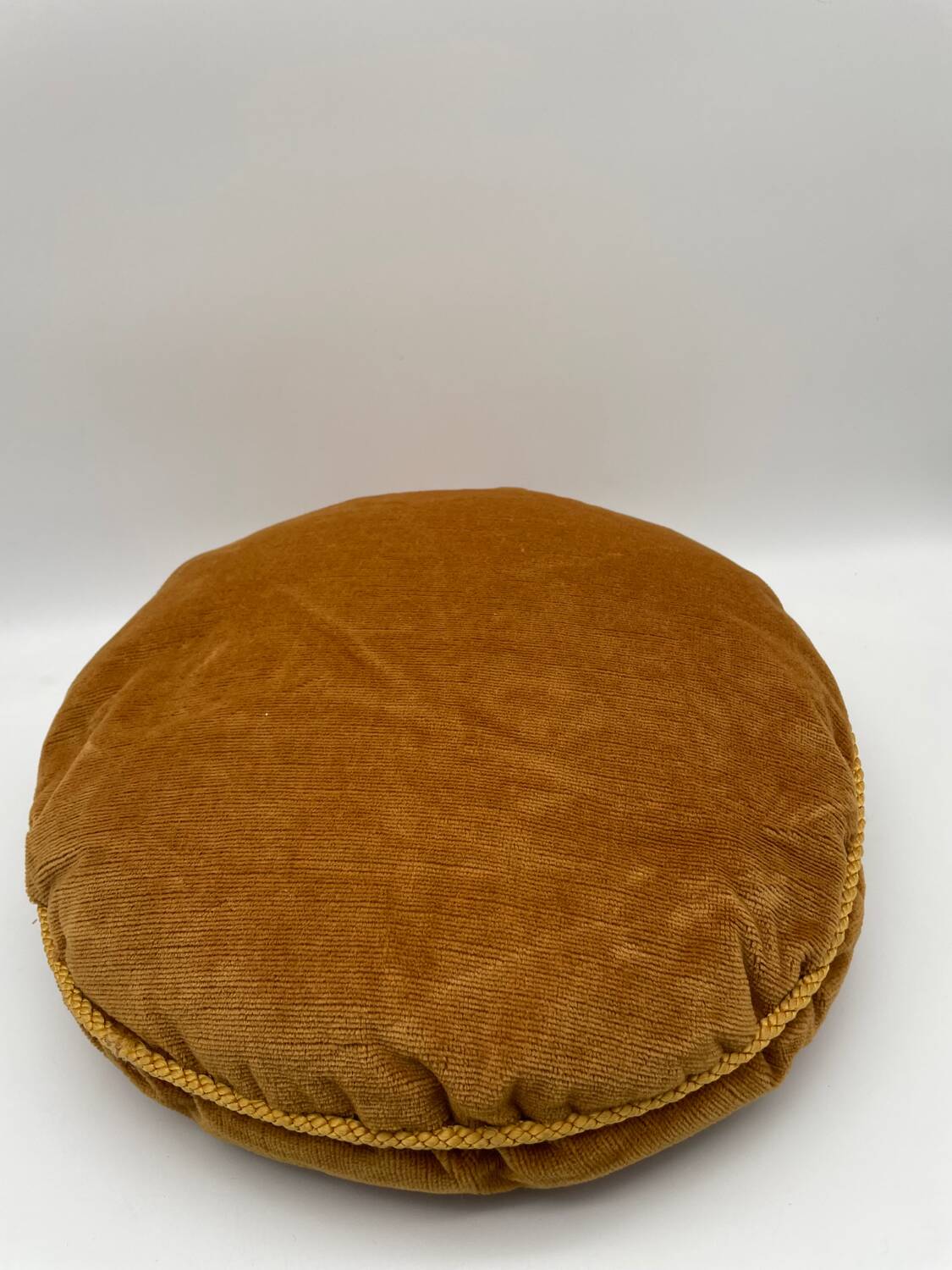 Pair of vintage round velvet cushions