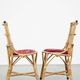 Set of 4 subtle and charming vintage 60s rattan boho chairs with colorful upholstered seats