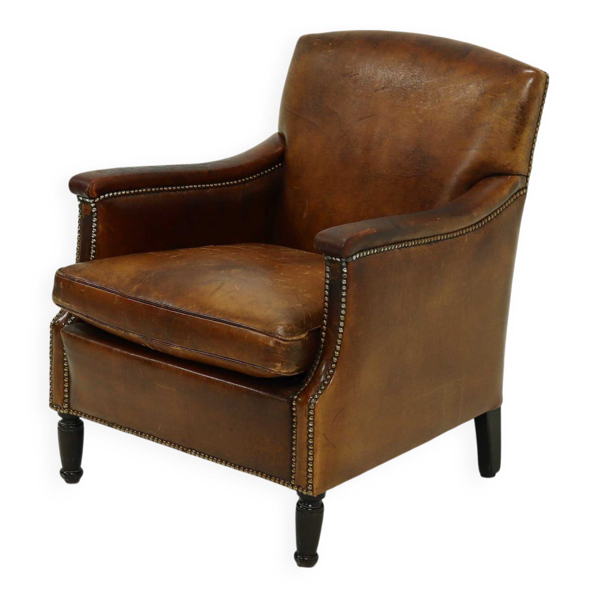 Fauteuil en cuir de mouton patiné années 1950