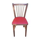 Vintage bistro chair sitting red