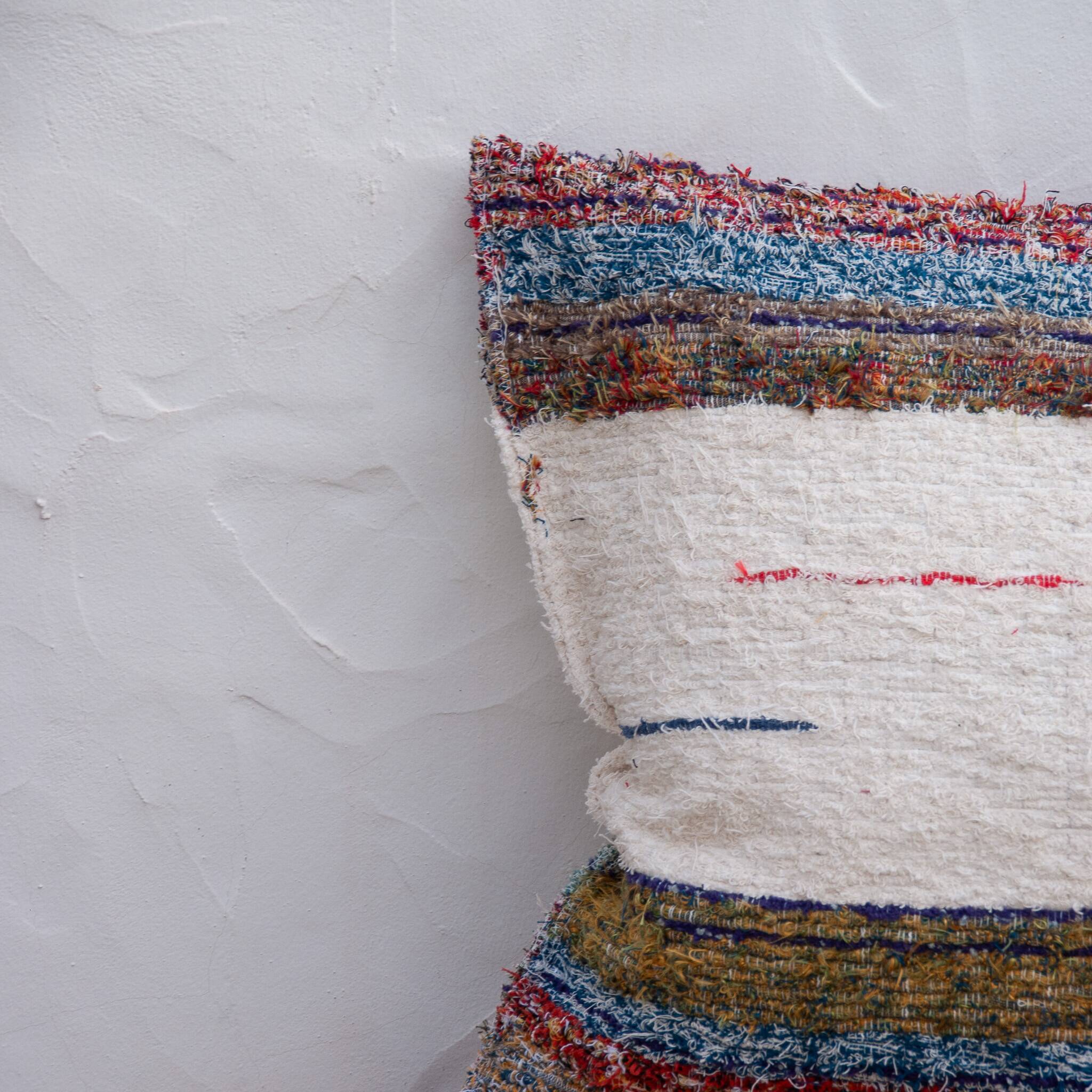 Handwoven cushion cover made from recycled cotton