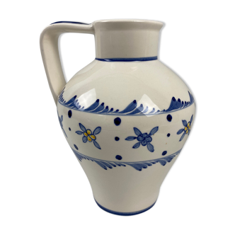 White ceramic vase decorating blue flowers