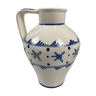 White ceramic vase decorating blue flowers