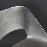 Four aluminium chairs by Pierre Guariche