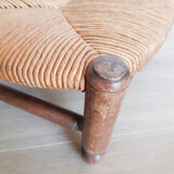 Low wooden stool and straw