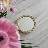 Old small round wicker mirror