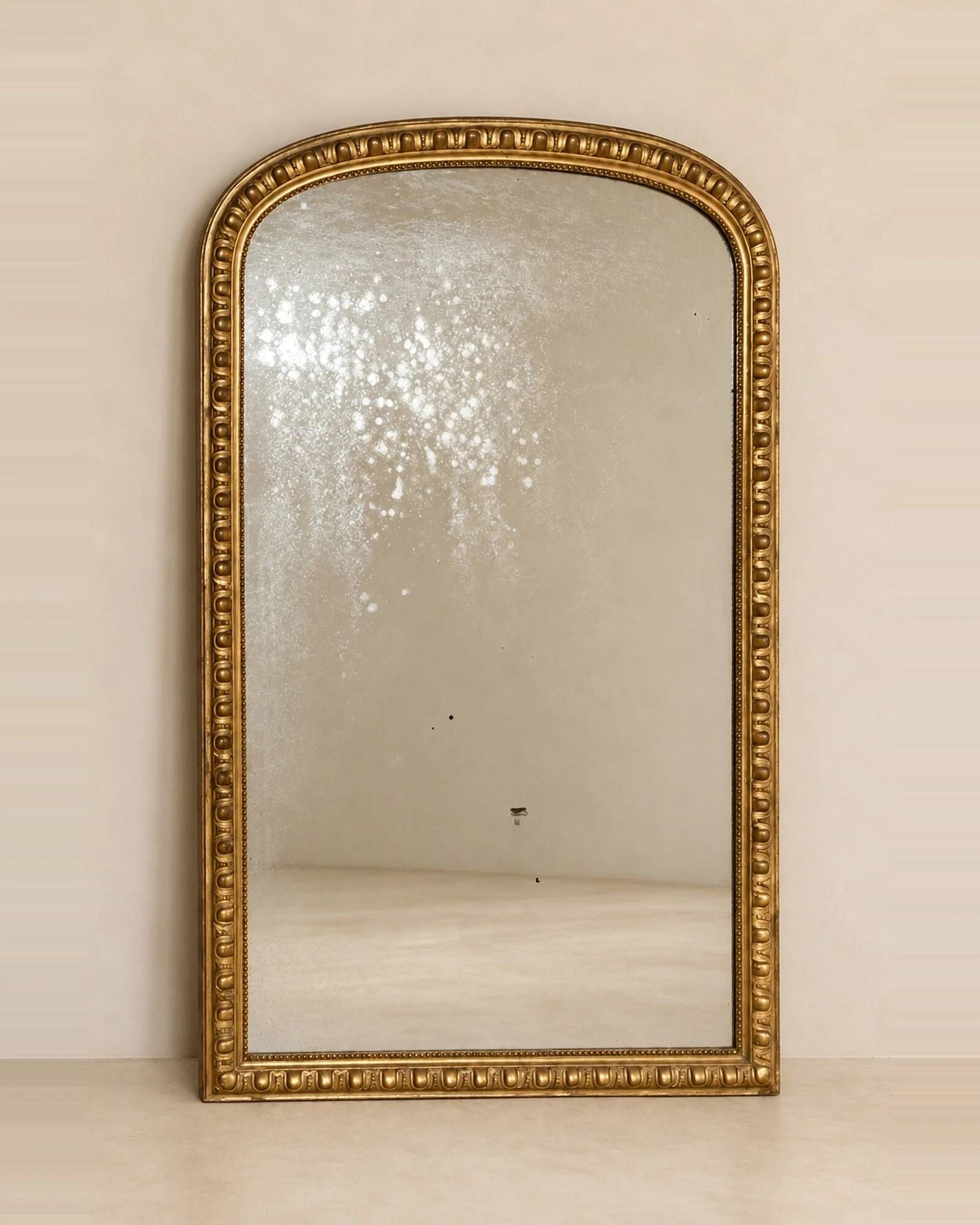 Large Louis-Philippe mirror with a gadrooned decoration — France, 19th century