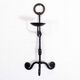 Antique iron candle holder
