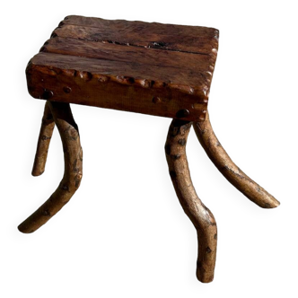 Solid wood stool in brutalist style