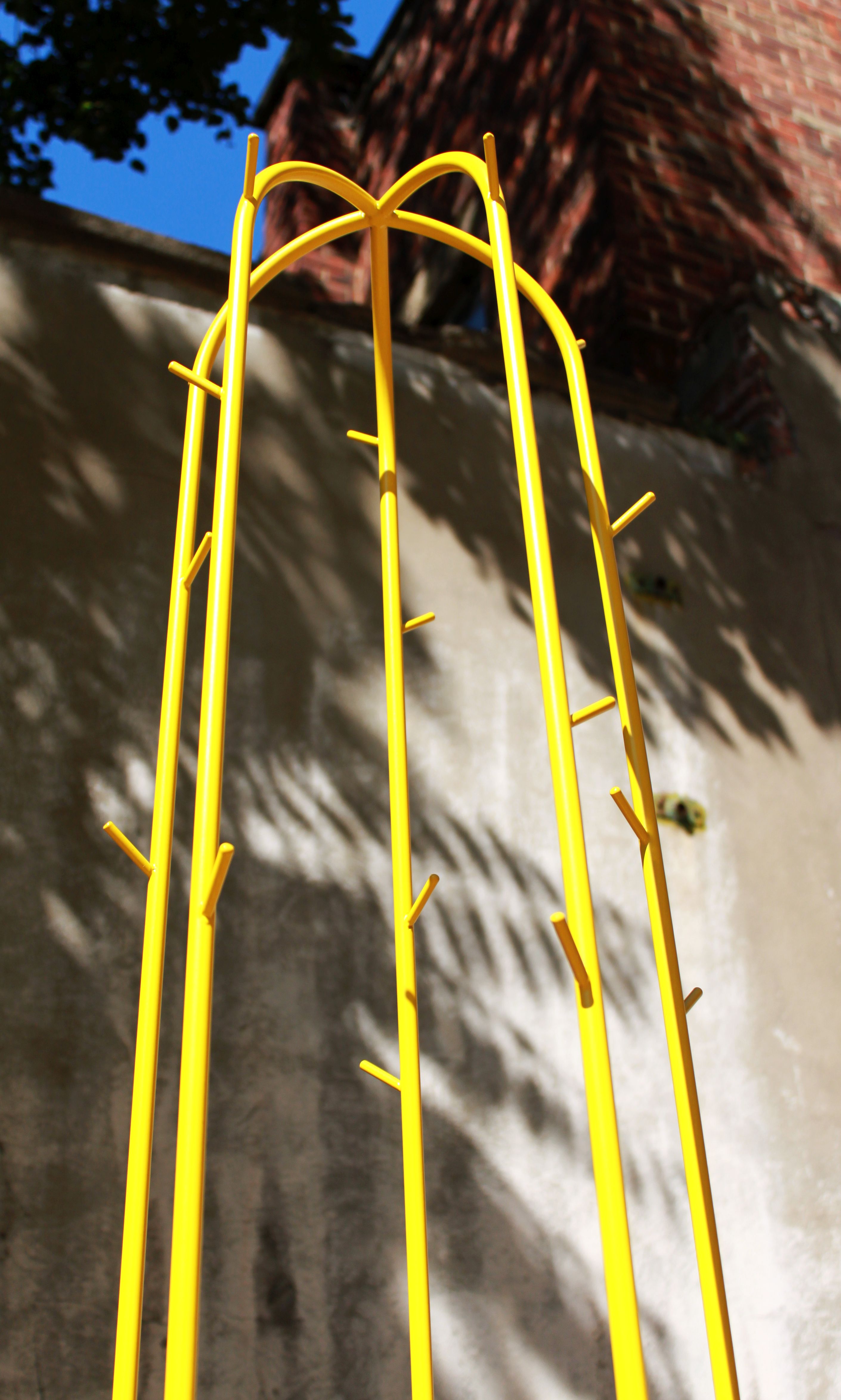 Yellow lase metal coat hanger 90's