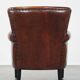 Sheepskin armchair/lounge chair finished with decorative nailheads