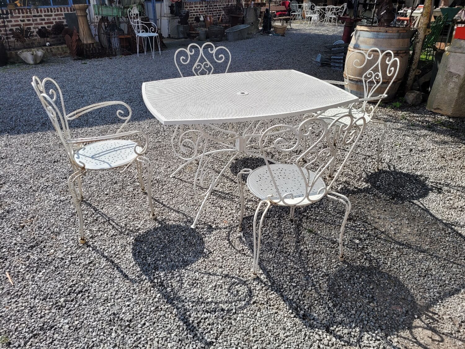 Old wrought iron garden furniture, table + 2 armchairs + 2 chairs