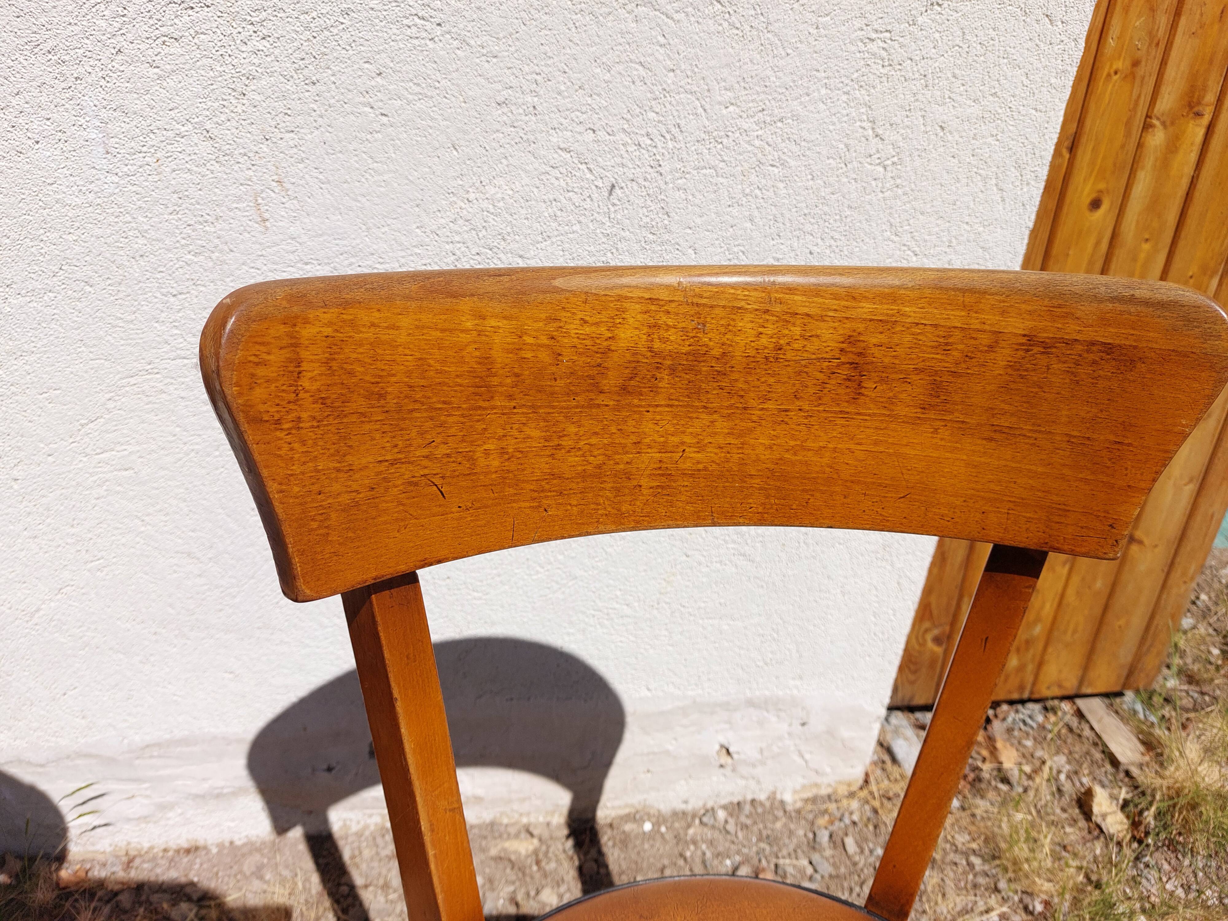6 vintage 1960s wooden bistro chairs with camel faux leather.