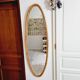 Miroir ovale en rotin 1960