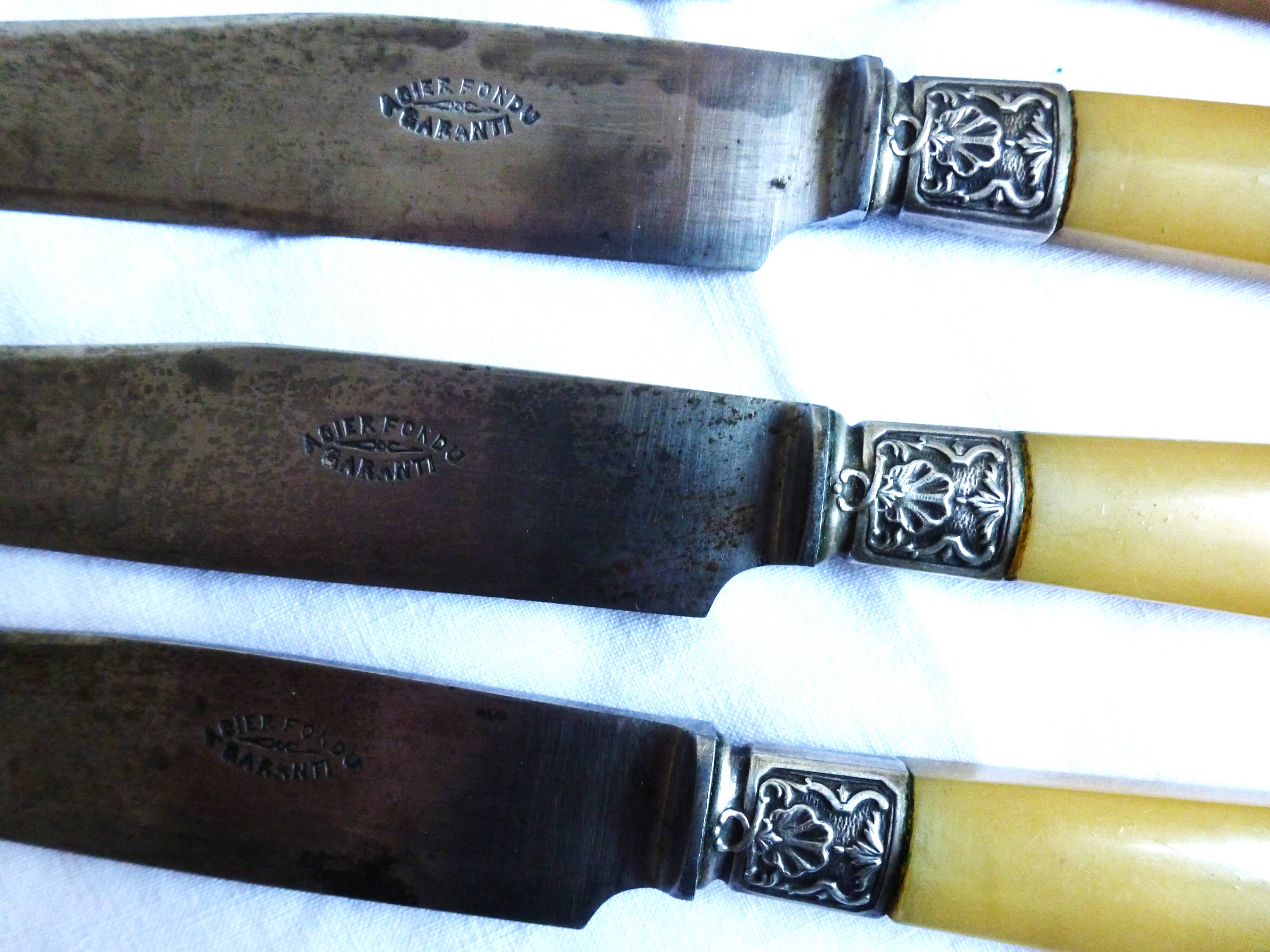 Art Deco cutlery, spoons, forks and table knives.