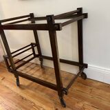 Constructivist wood and glass rolling table
