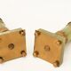 Pair of small candlesticks in golden brass and onyx