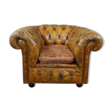 Patinated Chesterfield armchair