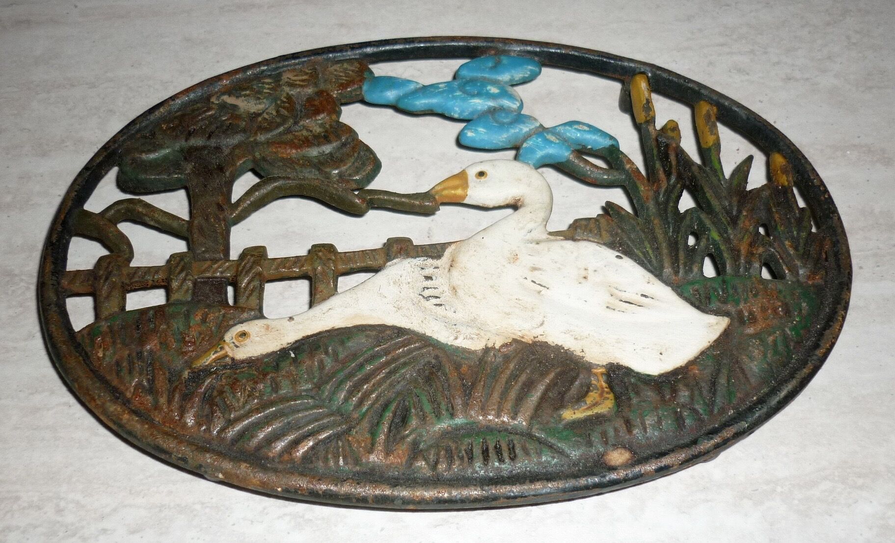 Underside of flat couple of steel geese