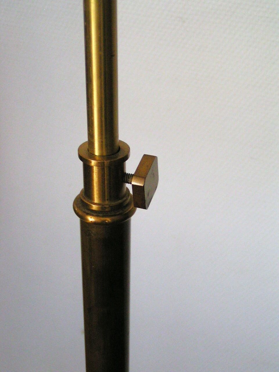 Articulated brass floor lamp