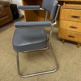 Old wooden desk and armchair