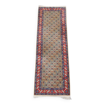 Colorful oriental runner with contrasting borders and cozy patterns, measuring 314x92 cm