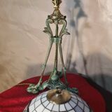 Antique patinated bronze regulator lamp with Tiffany glass shade in very good condition